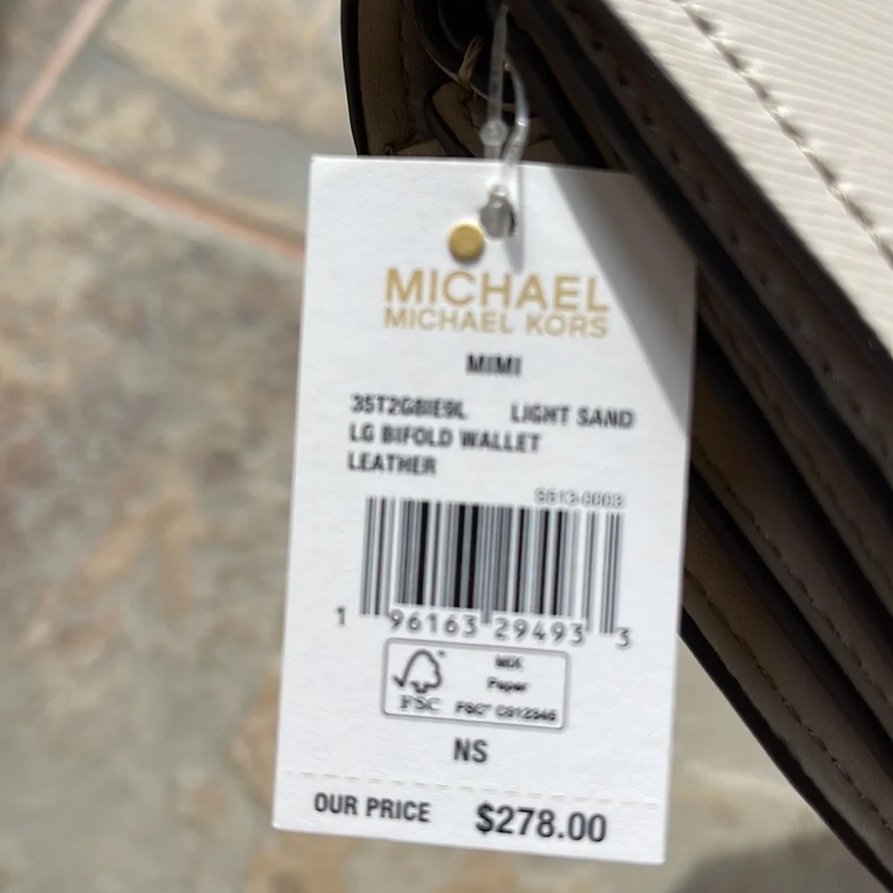 Michael Kors Mimi Large Saffiano Leather Bi-Fold Continental Wallet
Light Sand - Picture 16 of 16